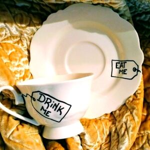 White Alice In Wonderland Tea Cup and Saucer Set with Black Text